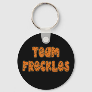 Teamfreckles-T-Shirts, Kapuzenpullis, Knöpfe Schlüsselanhänger