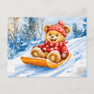Teddybär beim Schlittenfahren im Winter Postkarte