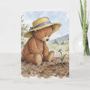 Teddybär starrt auf eine wachsende Margerite Karte