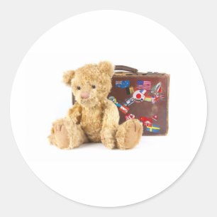 Teddybär und Vintager alter Koffer mit Weltwti Runder Aufkleber