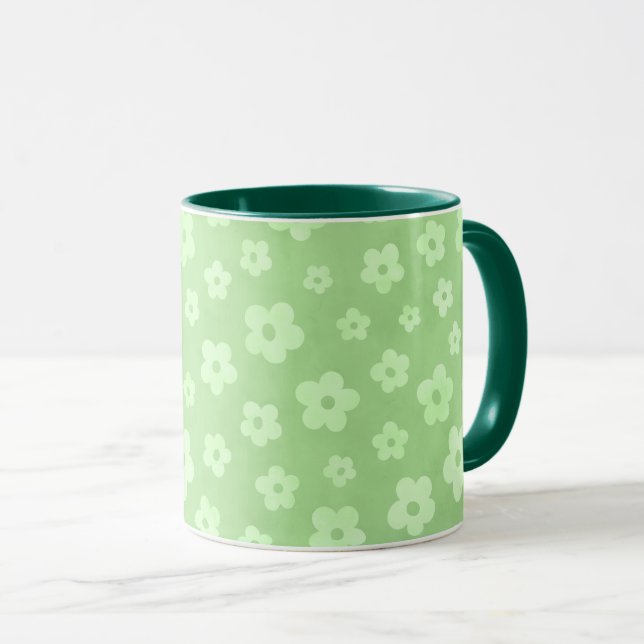 Teetasse mit grünem Griff und grüner Blume (VorderseiteRechts)