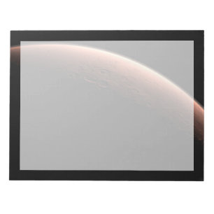 Teil der Mars an der Grenze von Licht und Dunkel. Notizblock