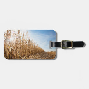 Teils geerntetes Mais-Feld Gepäckanhänger