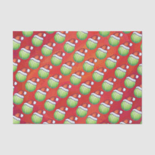 Tennis-Ball im Weihnachtsmannmütze-Muster auf Rot Seidenpapier