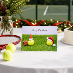 Tennis Christmas with tennis ball and Santa hat Feiertagskarte