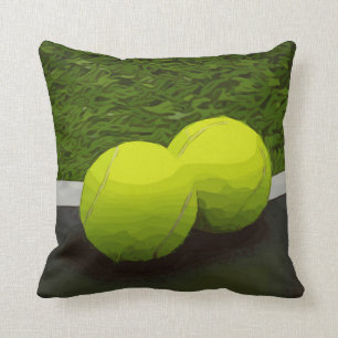 Tennisball auf grünem Gras Kissen