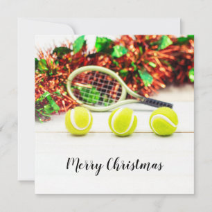 Tennisball und Schläger mit Weihnachtsdekoration Karte