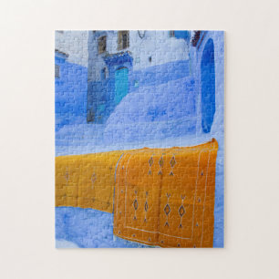 Teppiche an einer blauen Wand Puzzle
