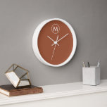 Terracotta Minimalistisch White Monogram Uhr<br><div class="desc">Minimalistisches White Monogram Emblem Terracotta Hintergrund Zuhause Büro Küche Wohnzimmer Badezimmer Uhr</div>