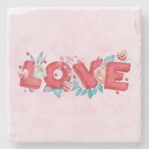 Text der roten Liebe in fett formatierten Blockbuc Steinuntersetzer