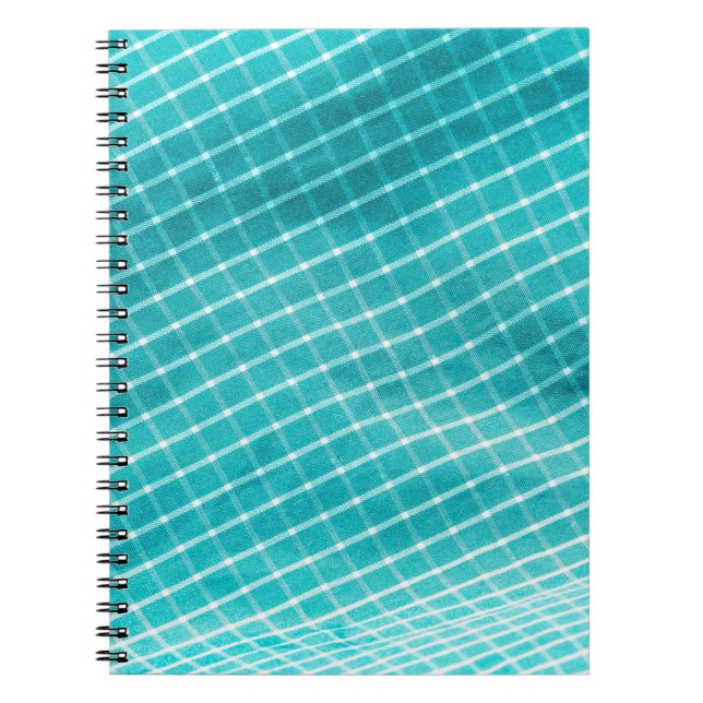 Textilverschluss im Hintergrund. Notizblock (Vorderseite)