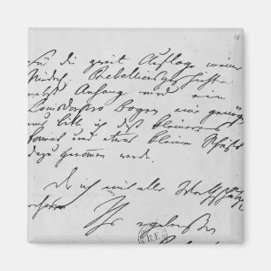 Textseite mit Unterschrift Magnet