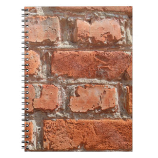 Textur aus alten, verwitterten Ziegeln. Hintergrun Notizblock