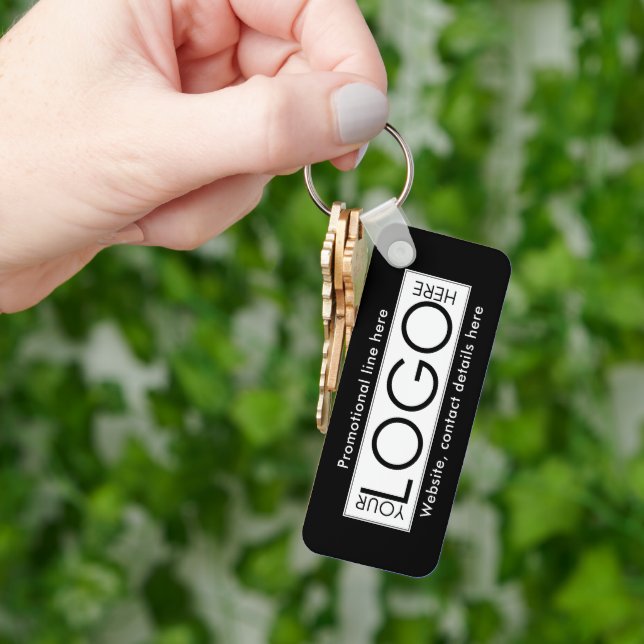 Textwerbung für berufliche Firmenlogos gibt Schwar Schlüsselanhänger (Hand)