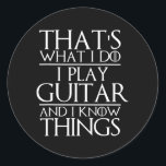 That's What I Do I Play Guitar and I Know Things Runder Aufkleber<br><div class="desc">That's What I Do I Play Guitar and I Know Things Guitarist Gift. Perfect gift for your dad,  mom,  dad,  men,  women,  friend and family members on Thanksgiving Day,  Christmas Day,  Mothers Day,  Fathers Day,  4th of July,  1776 Independent Day,  Veterans Day,  Halloween Day,  Patrick's Day</div>