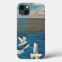 Three White Seagulls Flying Over the Water