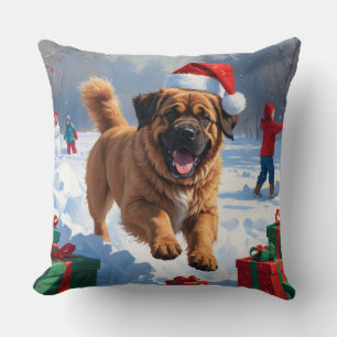 Tibetan Mastiff läuft mit Weihnachtsmut im Schnee Kissen