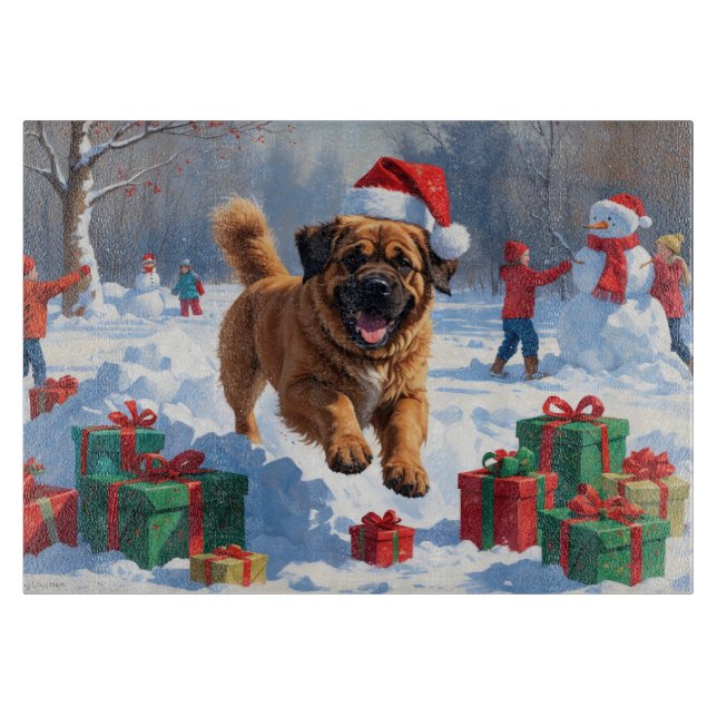 Tibetan Mastiff läuft mit Weihnachtsmut im Schnee Schneidebrett (Vorderseite)
