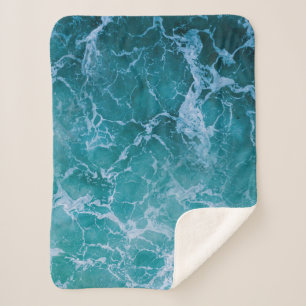 Tiefblaue Ozeanwellen Sherpadecke