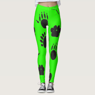 Tier- und Vogelfußabdruck, grüner Hintergrund Leggings