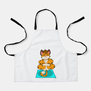 Tiger beim Yoga auf Yoga-Matte Schürze