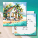 Tiny Zuhause auf der Beach Festive Weihnachten<br><div class="desc">Personalisierte Weihnachtskarte. Niedliches kleines festliches kleines,  festliches Haus am Strand mit hübschen Weihnachtsdekorationen wie Kränze,  Garland und Weihnachtsbeleuchtung auf Palmen. Auf der Rückseite der Karte können Sie Ihre eigene Urlaubsmeldung hinzufügen.</div>