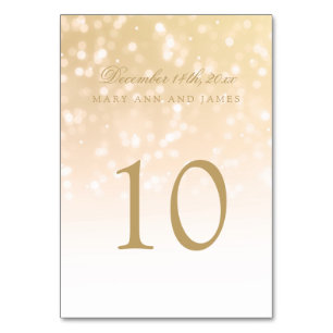 Tischnummer-GoldBokeh Schein-Lichter Tischnummer