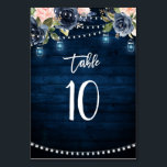Tischnummer von Navy Blue Blush Floral String Ligh<br><div class="desc">Elegante und moderne romantische Aquarellblume Hochzeitskarte mit Details und Rsvp-Tischnummern, mit einem Bouquet aus Rosa, Marineblau, Pfirsich, Aquarellfarben Rose mit passendem Laub und Saitenleuchten und Maurerglerhintergrund . Ideal für einen Herbst / Hochzeitsmitte. Weitere passende Designs und Variationen finden Sie in meinem "Blitzweddingpaperie" Shop. Und zögern Sie nicht, mich für weitere...</div>