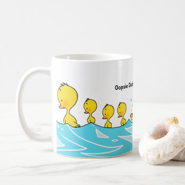 Törichte Ente macht einen Spritzer Kaffeetasse (Mit Donut)