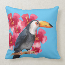 Toucan mit roten tropischen Blumen