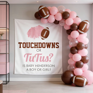 Touchdowns oder Tutus Geschlechtsenthüllungshinter Wandteppich