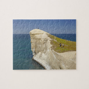 Touristen auf der Klippe am Tunnel Beach Puzzle