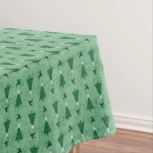 Traditionelle grüne Weihnachtsbäume und Rentiere Tischdecke