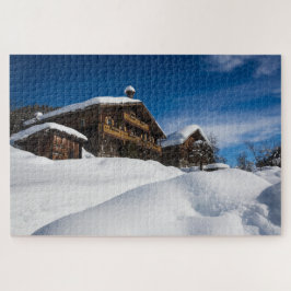 Traditionelle Holzhütten im Schnee Puzzle