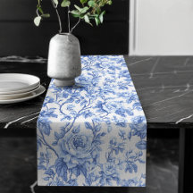Traditioneller blauer Toile-Rosen-Blumentischläufe