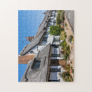 Traditionelles Englisch gepflasterte Hütten Puzzle