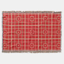 Traditionelles geometrisches Muster aus Rot und Go