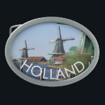 Traditionelles Grün-Weiß-Windmühlen-Foto Ovale Gürtelschnalle<br><div class="desc">Besuchen Sie die berühmten Holzwindmühlen des Freilichtmuseums Zaanse Schans, wenn Sie im Urlaub oder im Urlaub in Holland sind. Das sind echte, funktionierende originale Windmühlen aus dem Goldenen Zeitalter Hollands. Die Region Zaan leitet sich vom Fluss Zaan ab, einem breiten und faulen Feuchtgebiet, an dem sich viele Siedlungen befinden. Aufgrund...</div>