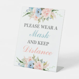 Tragen Sie bitte eine Maske mit dem Geschlecht Sockelschild