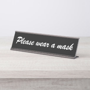 Tragen Sie eine Maske, ein schwarz-weißes, elegant Schreibtischnamensplakette