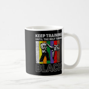 Training behalten, bis der Gürtel zum schwarzen Ta Kaffeetasse