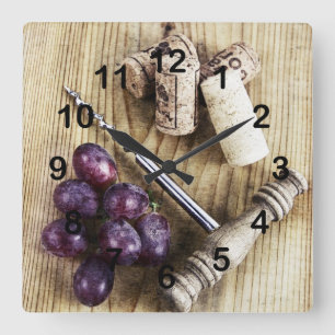 Trauben, Weinflaschenkorken und Korkenzieher Quadratische Wanduhr