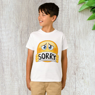 Trauriges Sorry Emoji Gesicht hält Entschuldigungs T-Shirt