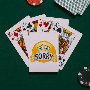Trauriges Sorry Emoji Gesicht mit Entschuldigungss Spielkarten