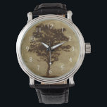 Tree-Silhouette über Bronze-Hintergrund Armbanduhr<br><div class="desc">Ein Bronzestand dient als Schauplatz für diese Silhouette eines Baumes,  dessen Äste in der Brise schweben. Man fühlt sich fast so,  als könnte man den Rücken an diesen Baum Erholung,  auf dem Boden sitzen und ein langes Nickerchen nehmen.</div>