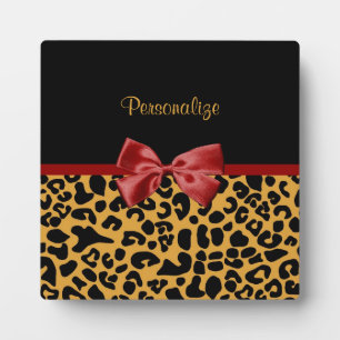 Trendschwarz und Gold Leopard Print Red Ribbon Bow Fotoplatte