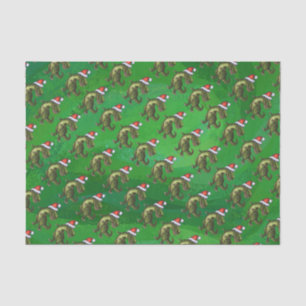 TRex in Weihnachtsmannmütze auf Grün Seidenpapier