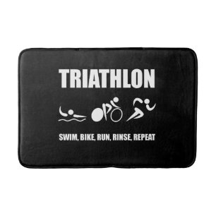 Triathlon-Spülen-Wiederholung Badematte