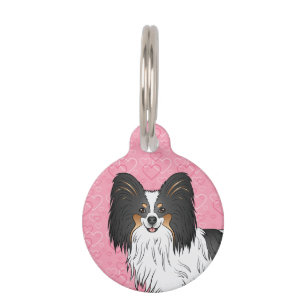 Tricolor Papillon Glücklicher Hundekopf auf rosa H Haustiermarke