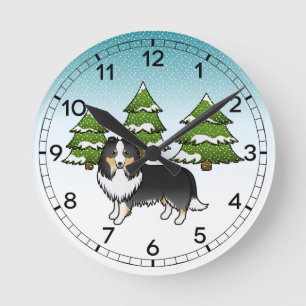 Tricolor Shetland Sheepdog in einem Winterwald Runde Wanduhr